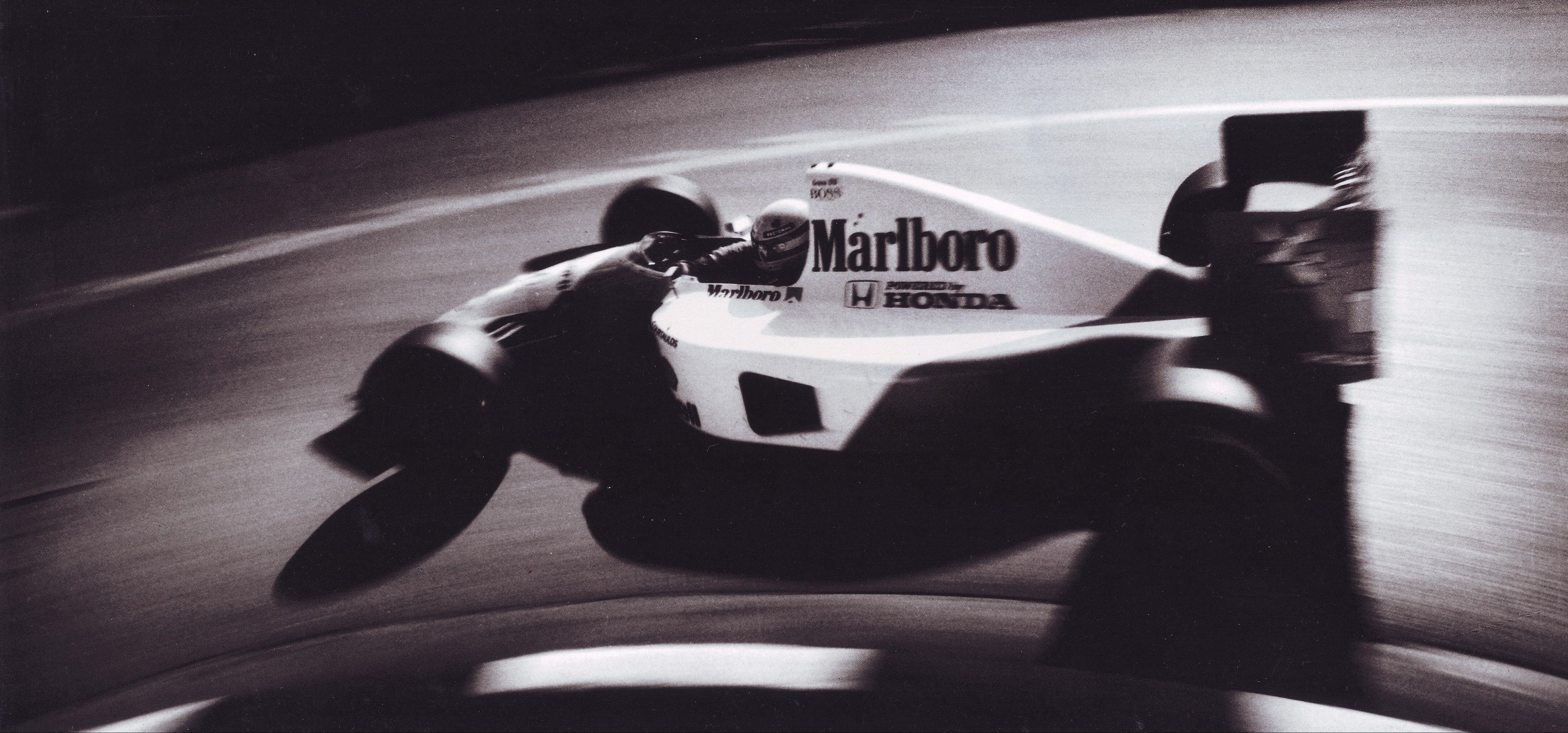 Formula 1 car with Marlboro and Honda branding on a track